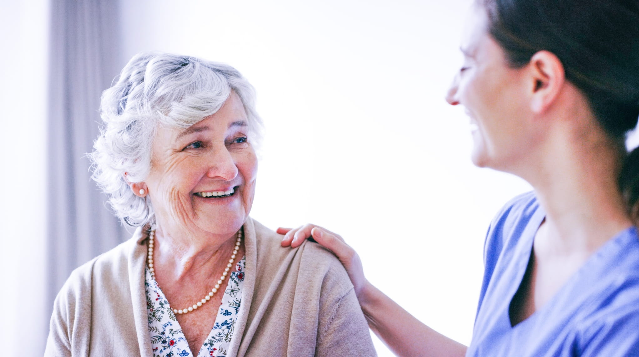 Elderly female pt and nurse_2044x1144