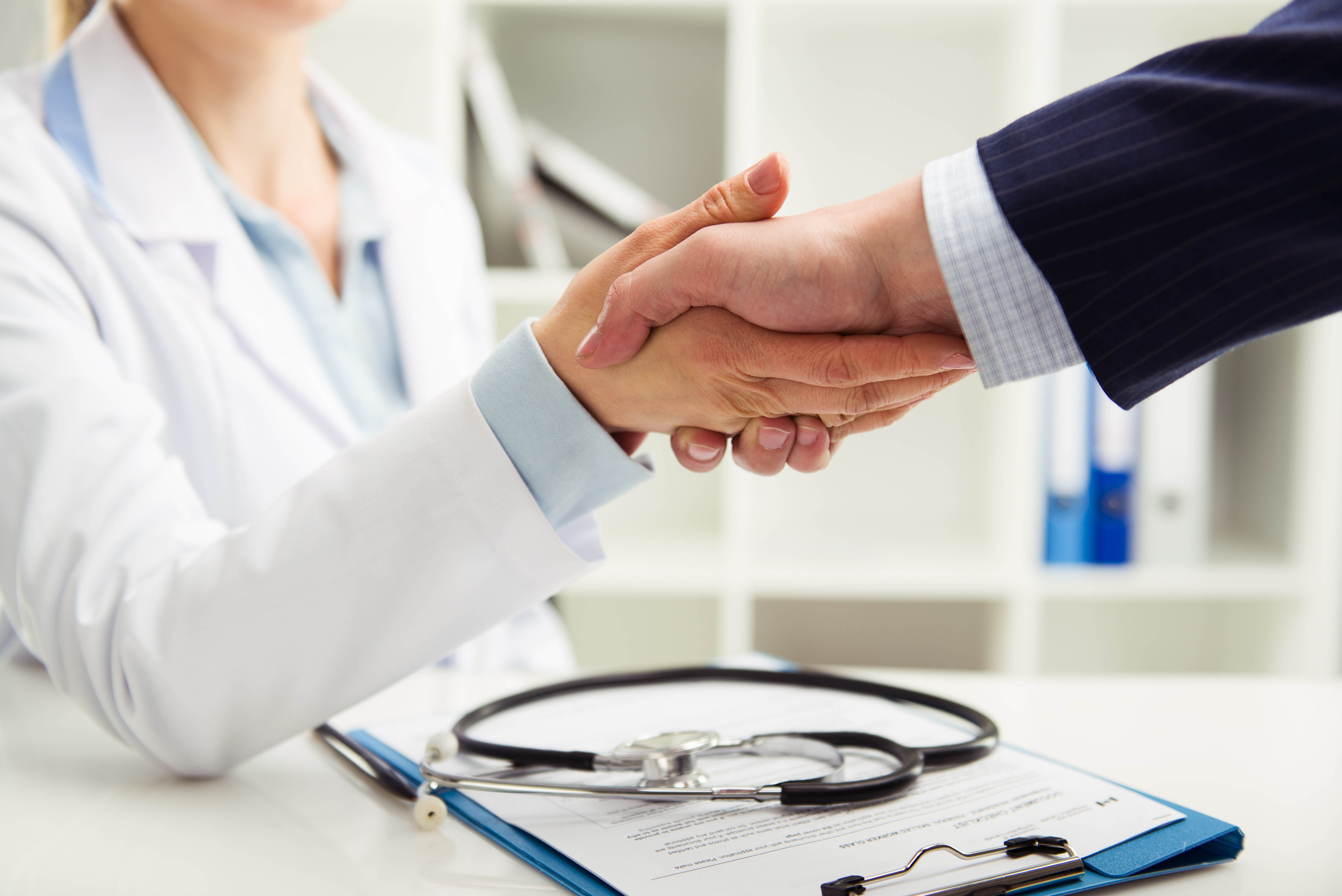 handshake between vet and business partner