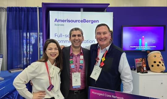 Team members at the AMCP 2023 exhibit